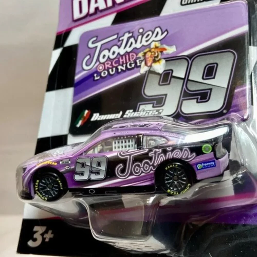 Nascar Authentics Tootsies Daniel Sua'rez 99 Wave 06 SKU-27661 Race Car NIP 2023